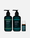 Manuka Biotic products in teal green pump bottles containing body lotion and body wash and a small glass bottle of organic mānuka oil